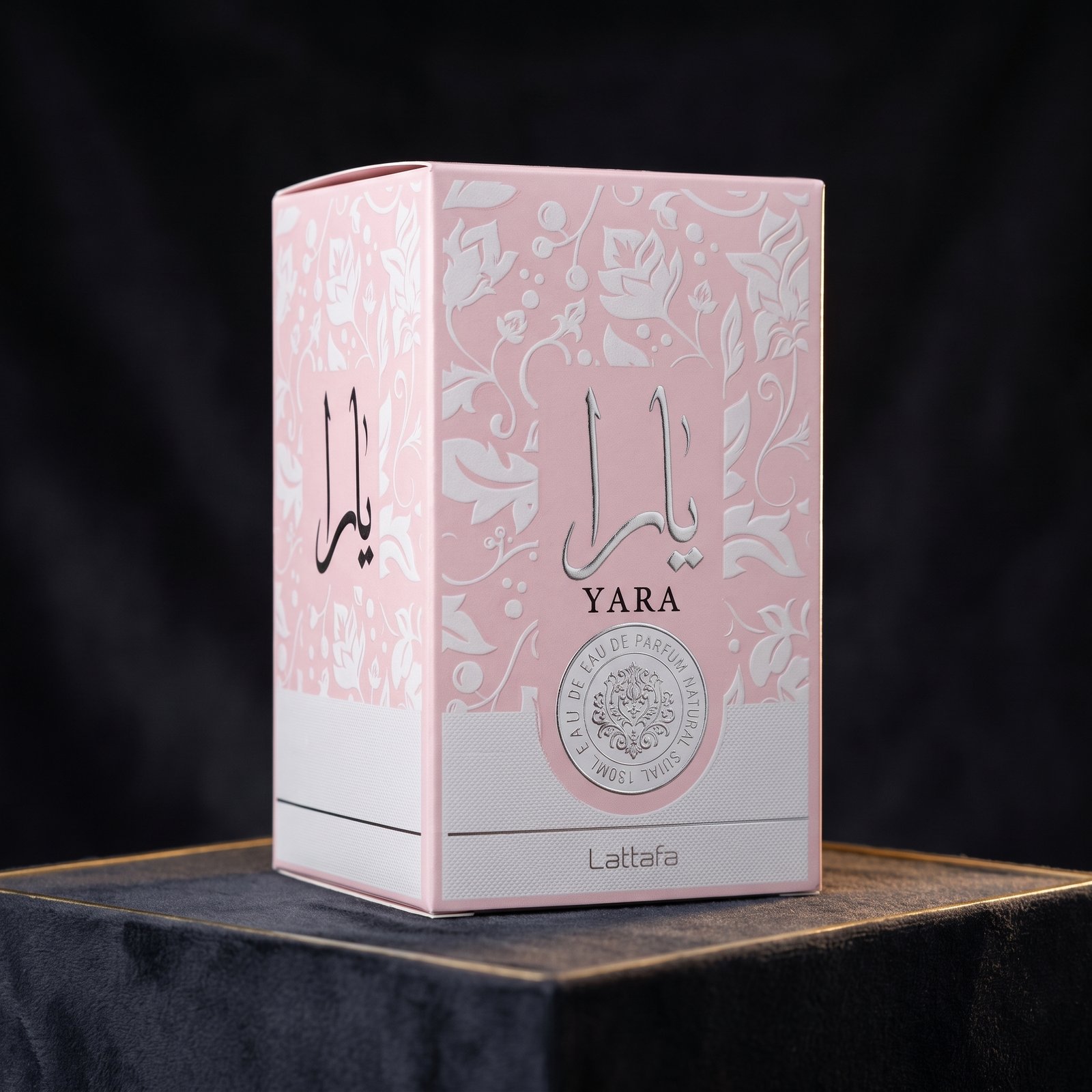 Lattafa Yara Pink EDP 100ml photographed in low light